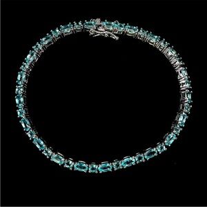 10ct Paraiba tone Topaz tennis bracelet. 14k White Gold over 925 silver. 7"